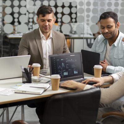 HR consultants discussing talent acquisition strategies with corporate clients